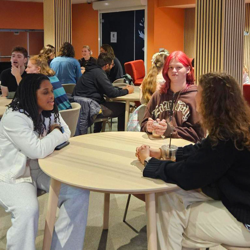 Students socialising in The Lounge
